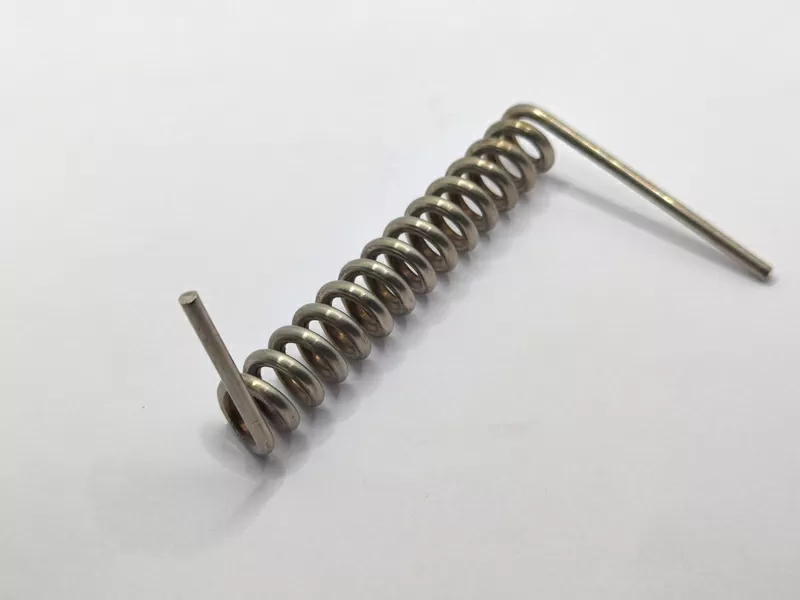 Single torsion spring with gap