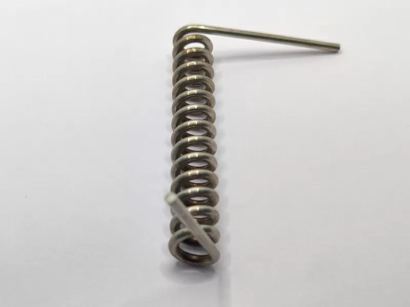 Single torsion spring with gap