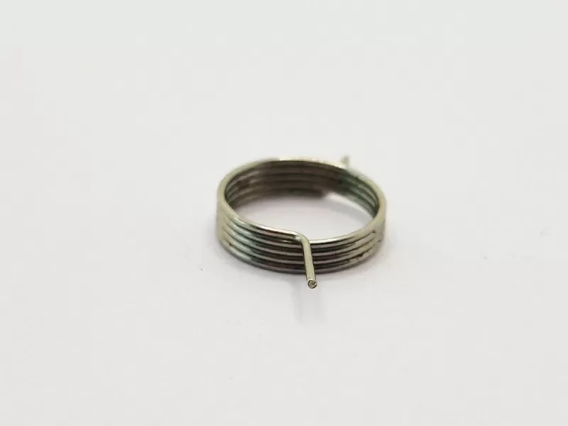 Precision Metal Coil Spring and Rod-End Ring Component